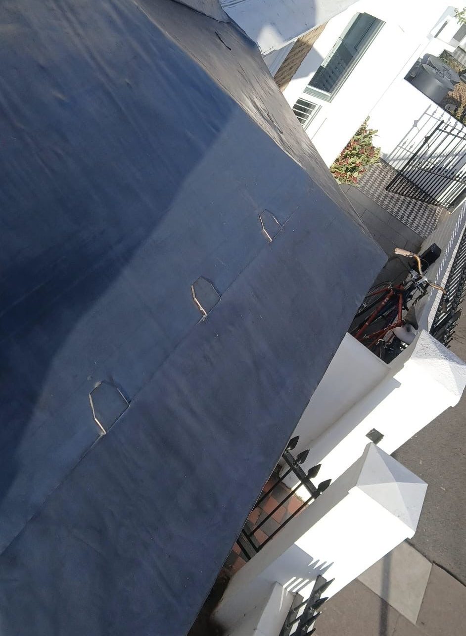 Finished torch-on felt flat roof with clean welded seams